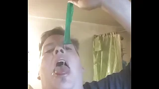 Pouring a cumfilled condom apropos my face